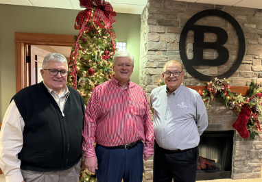 A picture of (left to right) Jerry Catlett, John Boehler, and Fred Bruning at John's retirement celebration.